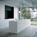 Modern One-wall kitchen with island in Caesarstone 1111 Vivid White