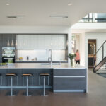 Modern One-wall kitchen with island in Caesarstone 1141 Pure White